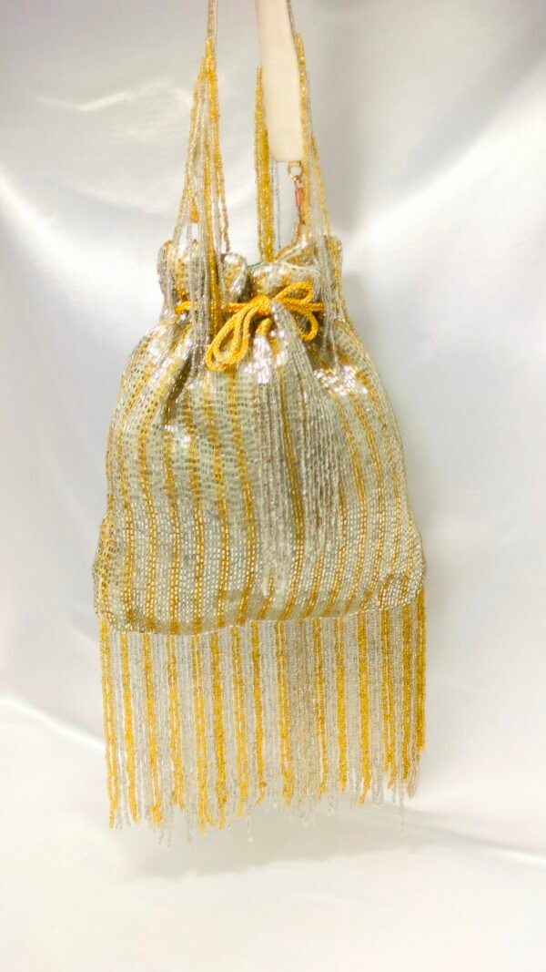 Golden Silver Katdana Potli | www.radiantjewels.stor